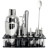 Shaker du coffret démonté en trois parties montrant le bouchon, le couvercle passoire et le gobelet en inox