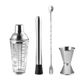 Set barman cocktail complet : shaker doseur, pilon, cuillère torsadée et doseur double sur fond blanc