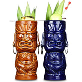 Duo de verres tiki Tahiti coloris marron cocotier et bleu océan garnis de feuilles d'ananas et de fruits