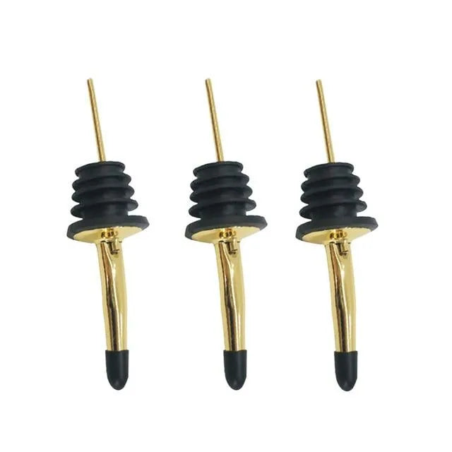 Lot de trois becs verseurs dorés pour bouteille d'alcool, photo produit sur fond blanc.