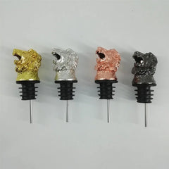 Les quatre coloris disponibles du bec verseur tête de lion : doré, argenté, rose gold et noir gunmetal