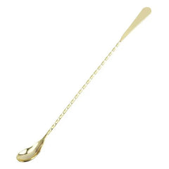 Cuillère à cocktail grande taille en finition dorée, présentée sur fond blanc