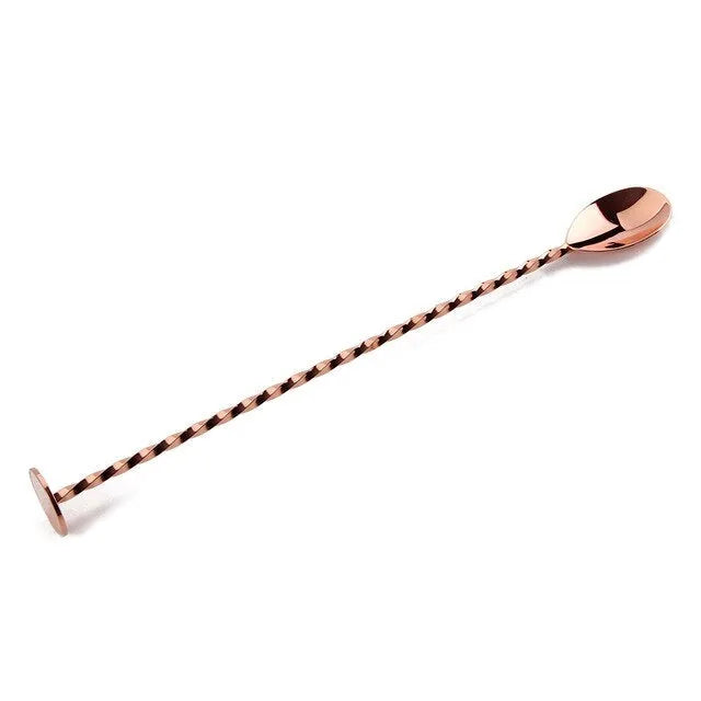 Cuillère à cocktail torsadée en acier inoxydable finition rose gold, présentée seule sur fond blanc.