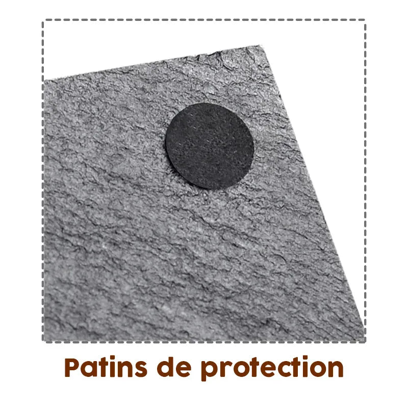Gros plan sur les patins de protection antidérapants collés au dos du dessous de verre en ardoise