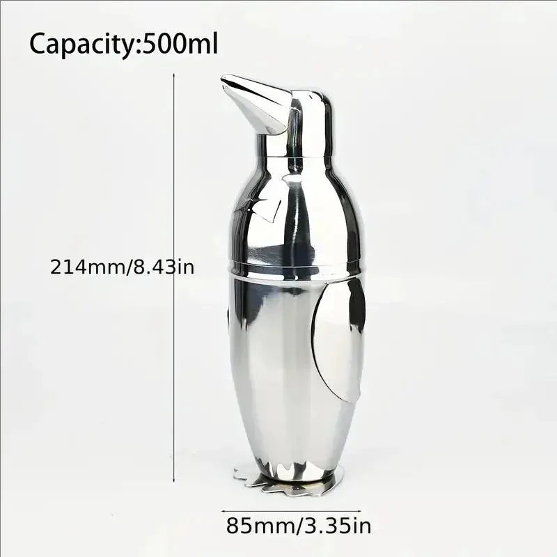 Shaker à cocktail pingouin en inox avec ses dimensions annotées, hauteur 214 mm et diamètre 85 mm, pour une contenance de 500 ml.