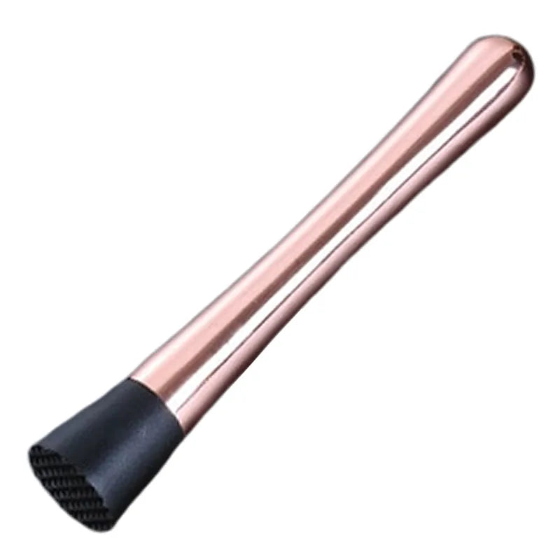 Pilon à cocktail en finition rose gold avec embout en caoutchouc noir, présenté seul sur fond blanc.